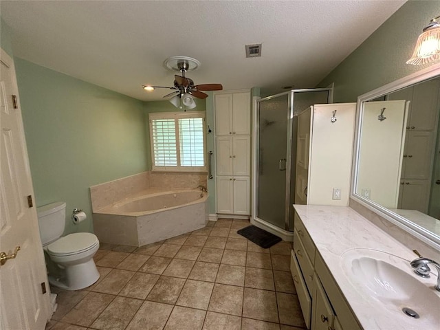 510 S Church St, Georgetown, TX 78626 - bathroom with a stall shower, ceiling fan, a garden tub, vanity, and tile patterned flooring