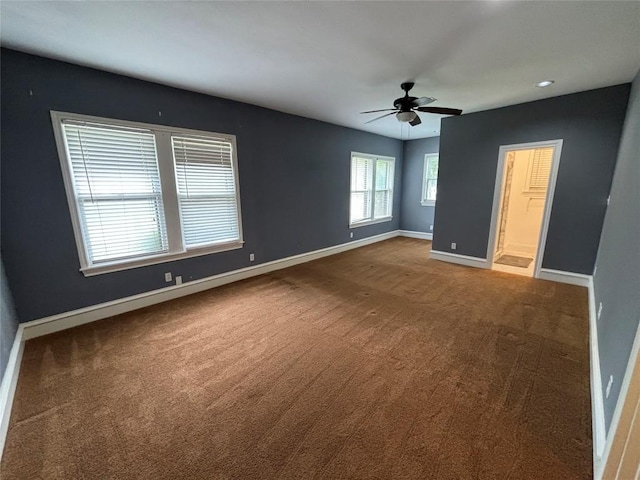 510 S Church St, Georgetown, TX 78626 - unfurnished bedroom featuring carpet floors, a ceiling fan, and connected bathroom