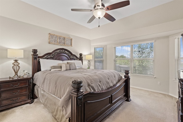 bedroom with light colored carpet and ceiling fan