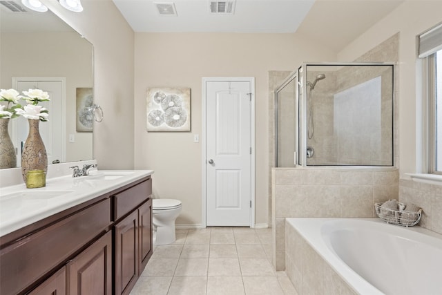 full bathroom featuring plus walk in shower, tile patterned flooring, toilet, and vanity