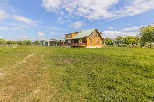 view of yard with a wooden deck