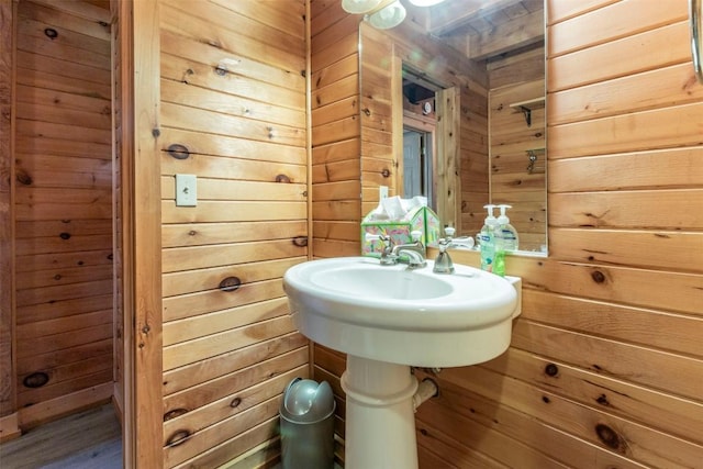 bathroom with wooden walls