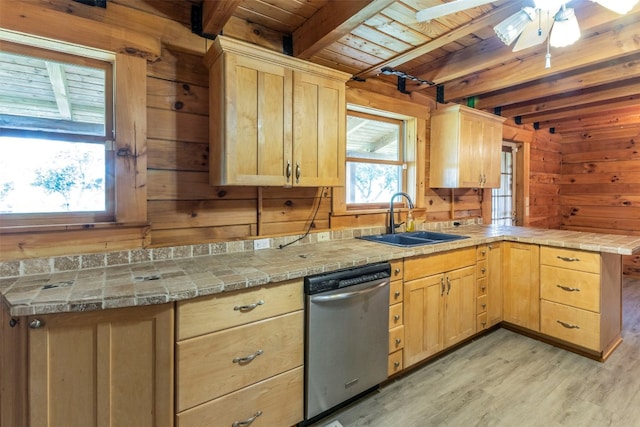 kitchen featuring beamed ceiling, wood ceiling, stainless steel dishwasher, sink, and ceiling fan