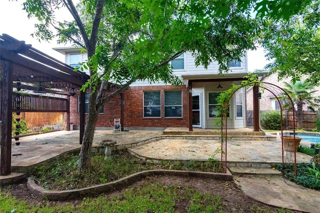 rear view of house with a patio area