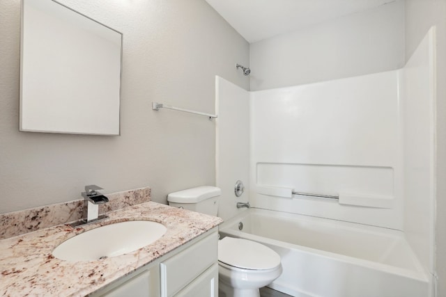 full bathroom featuring vanity, toilet, and washtub / shower combination