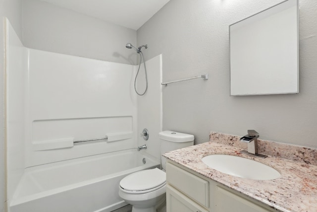 full bathroom with bathtub / shower combination, toilet, and vanity