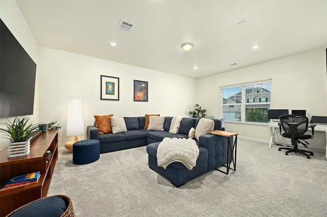 living room featuring light colored carpet