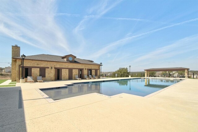 view of pool featuring a patio