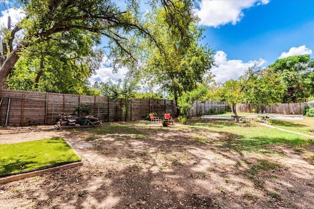 view of yard featuring a fenced backyard