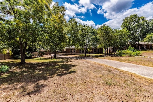 view of yard featuring fence