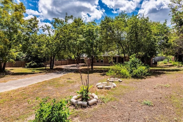 view of yard with fence