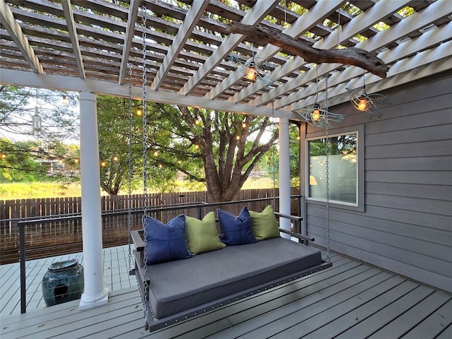 wooden deck featuring a pergola