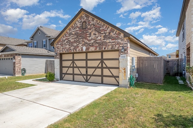 garage with a yard