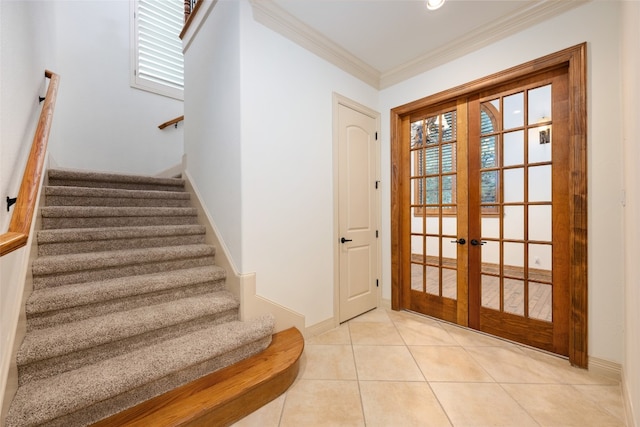 doorway to outside featuring french doors, light tile patterned floors, and crown molding