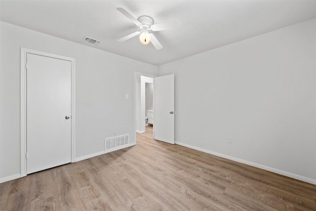 unfurnished bedroom featuring a closet, ceiling fan, and light hardwood / wood-style flooring