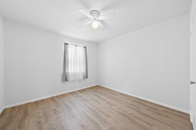 unfurnished room featuring ceiling fan and light hardwood / wood-style floors