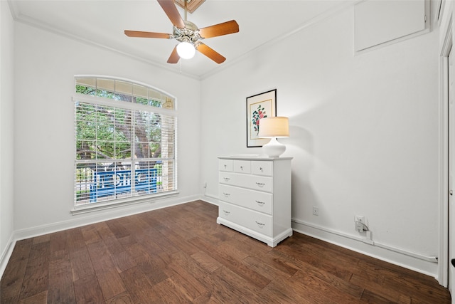 unfurnished bedroom with crown molding, ceiling fan, and dark hardwood / wood-style floors