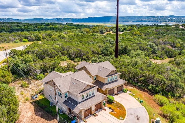 drone / aerial view featuring a mountain view