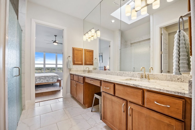 bathroom featuring ceiling fan, vanity, hardwood / wood-style floors, and an enclosed shower