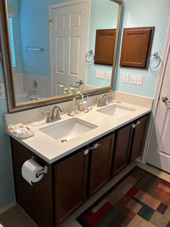 bathroom with double vanity