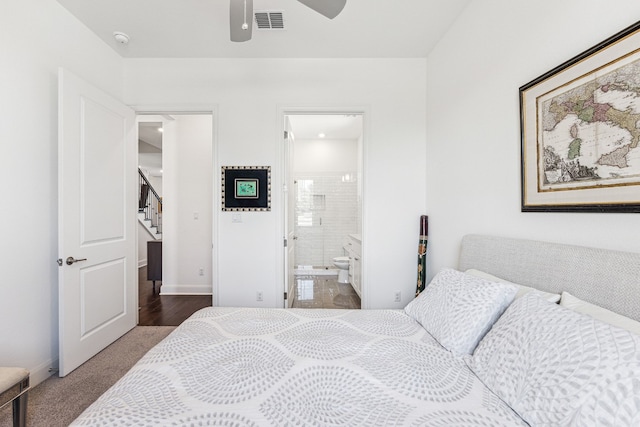 bedroom featuring baseboards, visible vents, a ceiling fan, and ensuite bathroom