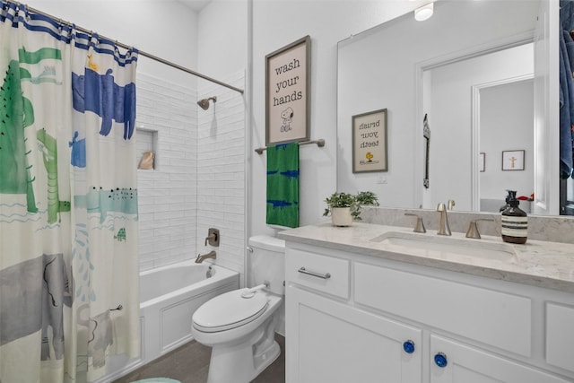 bathroom featuring shower / bathtub combination with curtain, toilet, and vanity