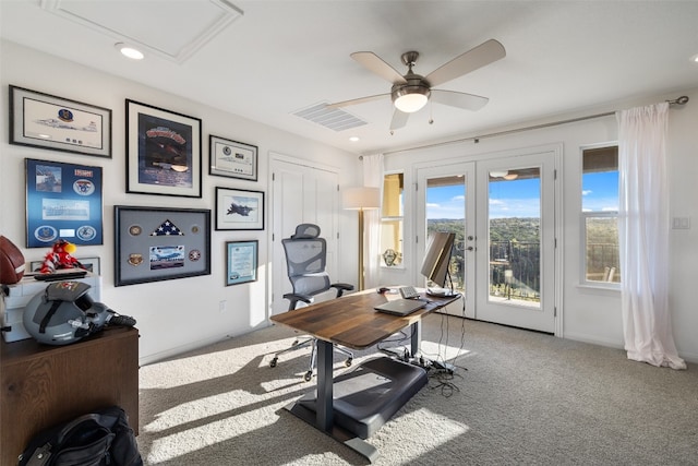 carpeted office space with ceiling fan, french doors, visible vents, and recessed lighting