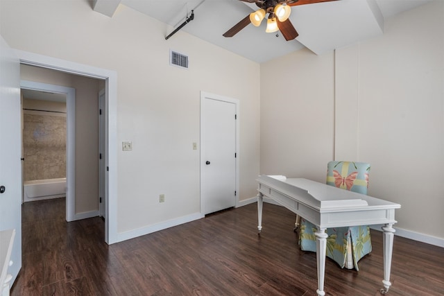 unfurnished office featuring ceiling fan and dark hardwood / wood-style floors