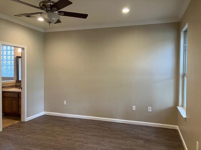 unfurnished room with ceiling fan, ornamental molding, sink, and dark hardwood / wood-style flooring