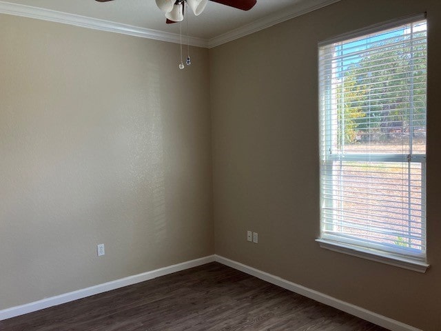 unfurnished room with ceiling fan, dark hardwood / wood-style flooring, and ornamental molding