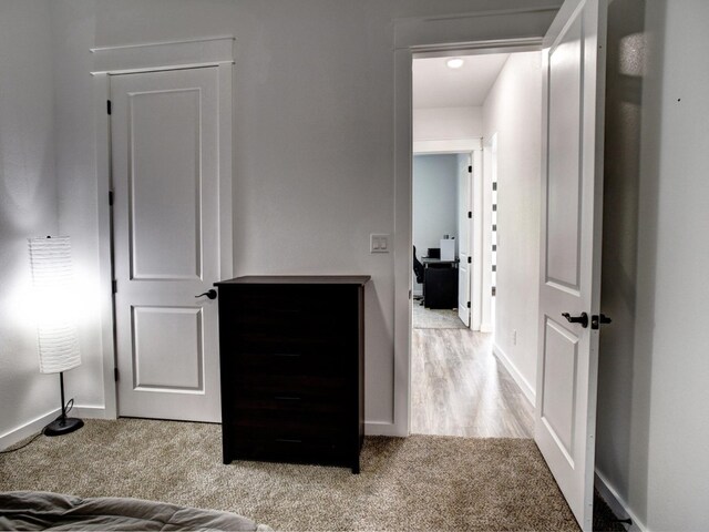 bedroom featuring light hardwood / wood-style flooring