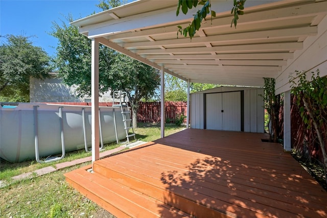 deck featuring a shed