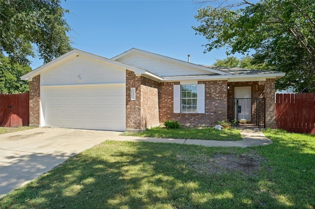 ranch-style home with a garage and a front lawn