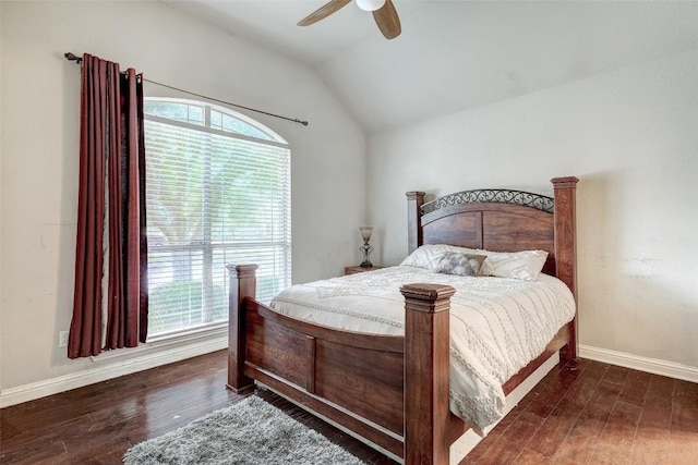 1102 Canyon Maple Rd, Pflugerville, TX 78660 - bedroom featuring multiple windows, wood finished floors, lofted ceiling, and baseboards