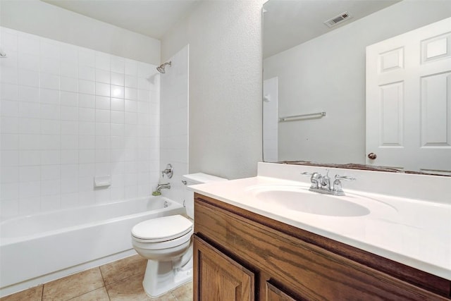 bathroom with tile patterned floors, visible vents, toilet, shower / washtub combination, and vanity