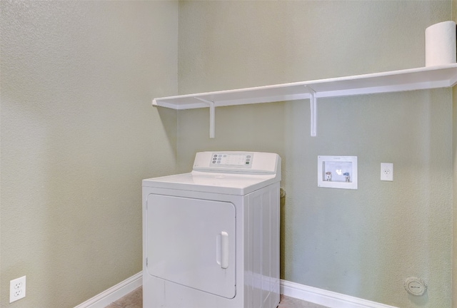 clothes washing area featuring washer / clothes dryer