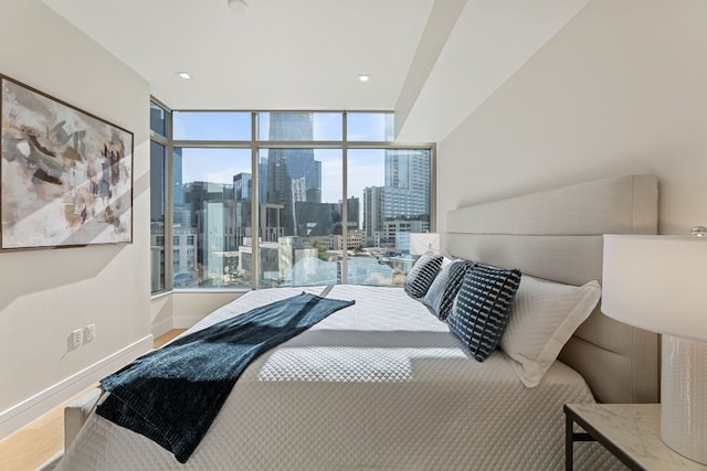 bedroom featuring hardwood / wood-style flooring