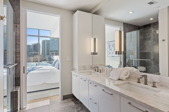 bathroom with vanity and walk in shower