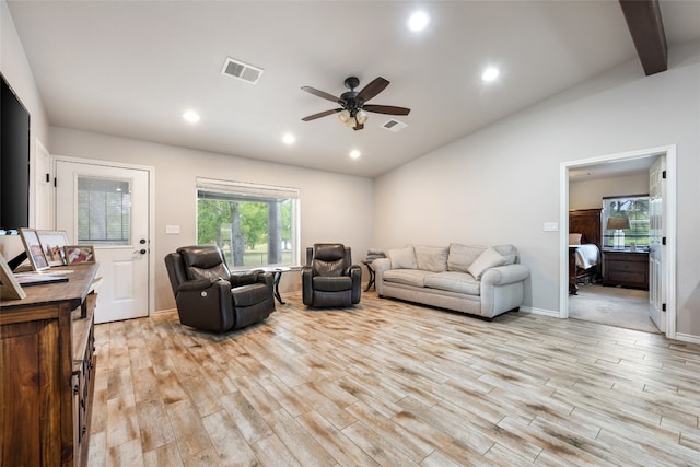 living room featuring ceiling fan, lofted ceiling with beams, and light hardwood / wood-style floors