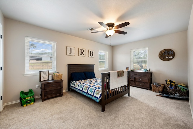 carpeted bedroom featuring ceiling fan