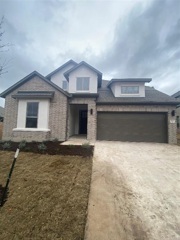 view of front of home featuring a garage