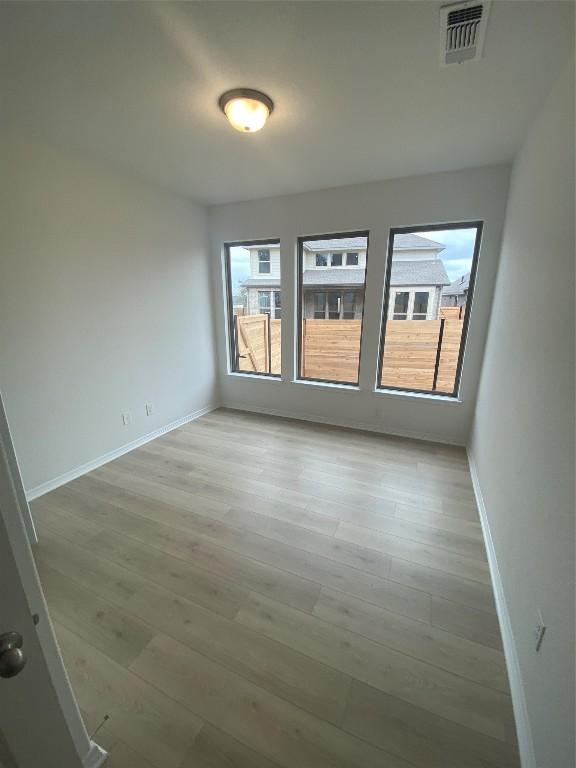 empty room featuring light wood-type flooring