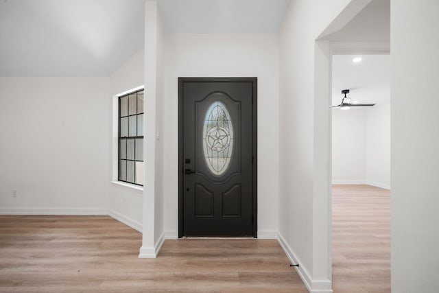 entrance foyer featuring plenty of natural light, ceiling fan, and light wood-type flooring