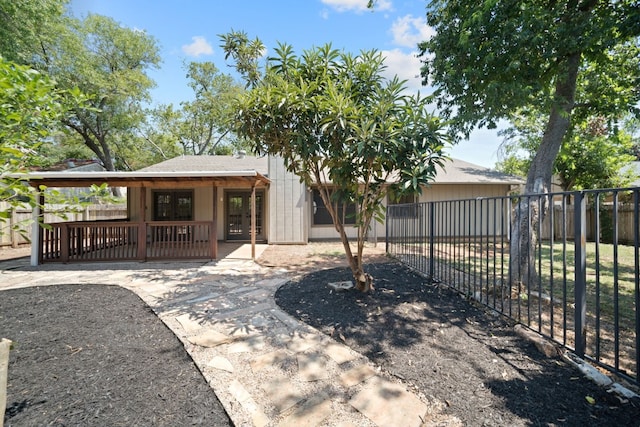 back of property with a patio area