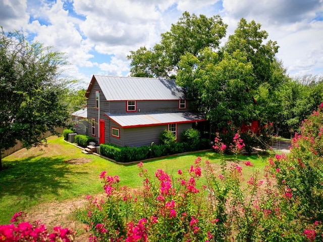 exterior space with a yard