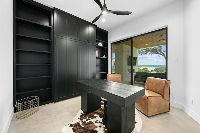 office space with ceiling fan and built in features