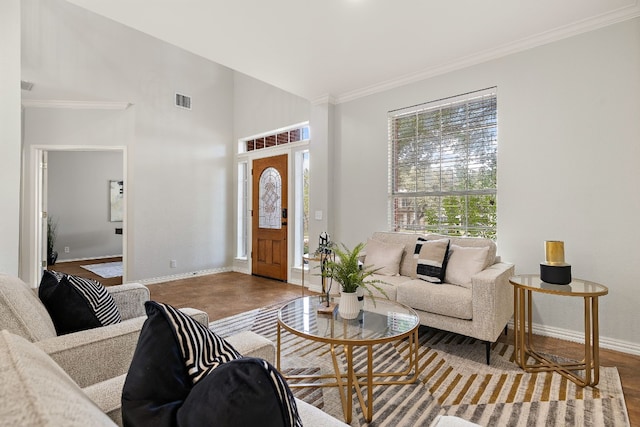 living room featuring hardwood / wood-style floors and ornamental molding