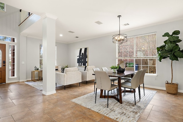 dining room featuring a notable chandelier and ornamental molding