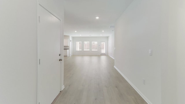 corridor featuring light wood-type flooring