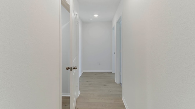 hall featuring light hardwood / wood-style flooring